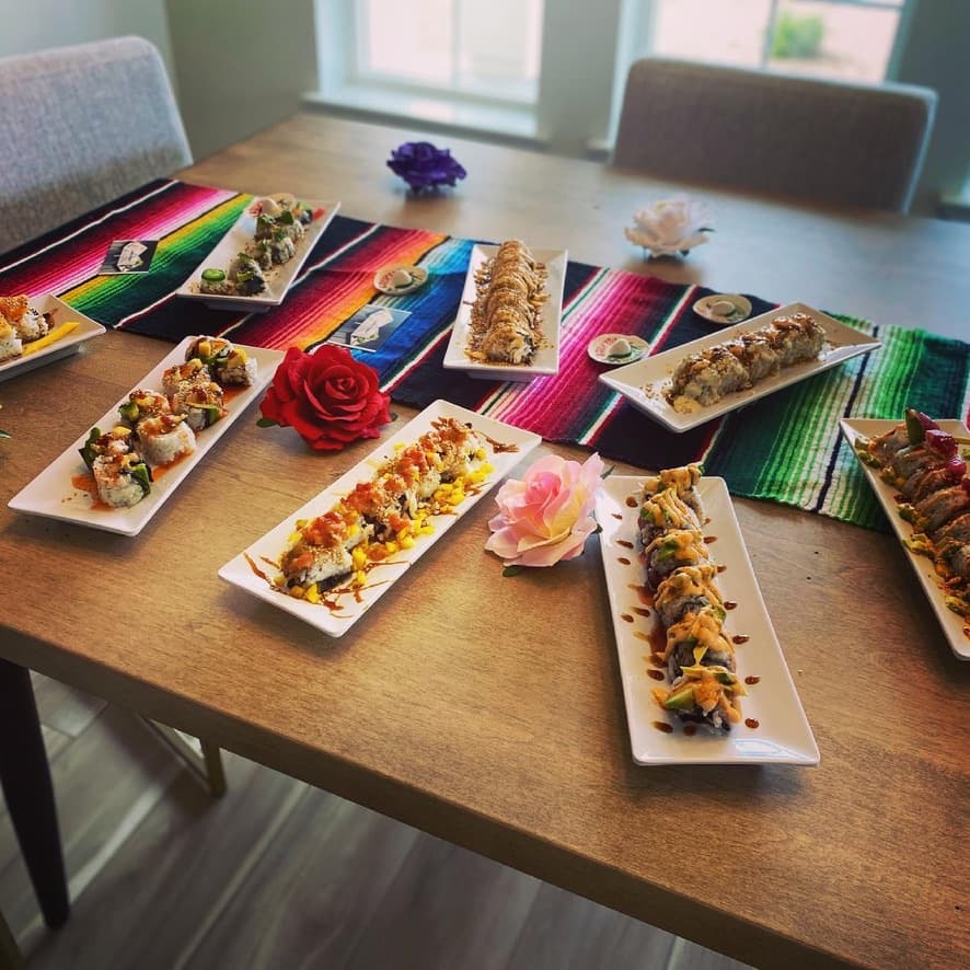 Variety of sushi rolls plated for guests